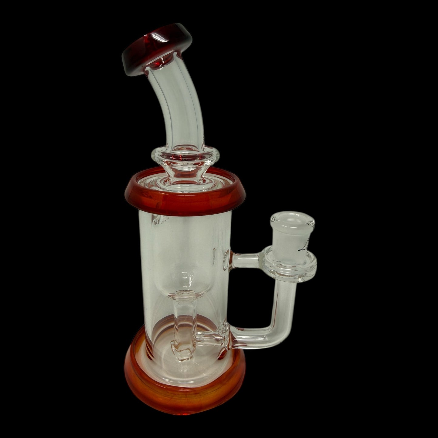 Clear glass smoking device with red accents on a black background